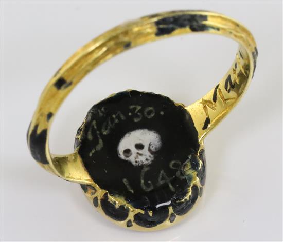 A rare mid 17th century enamelled gold oval memorial ring for Charles I (1600-1649), finger size K.